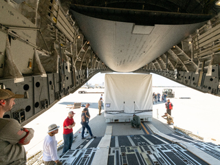 A view of SWOT as it was being loaded into a U.S. Air Force C-17 aircraft en route to Thales Alenia Space near Cannes, France.