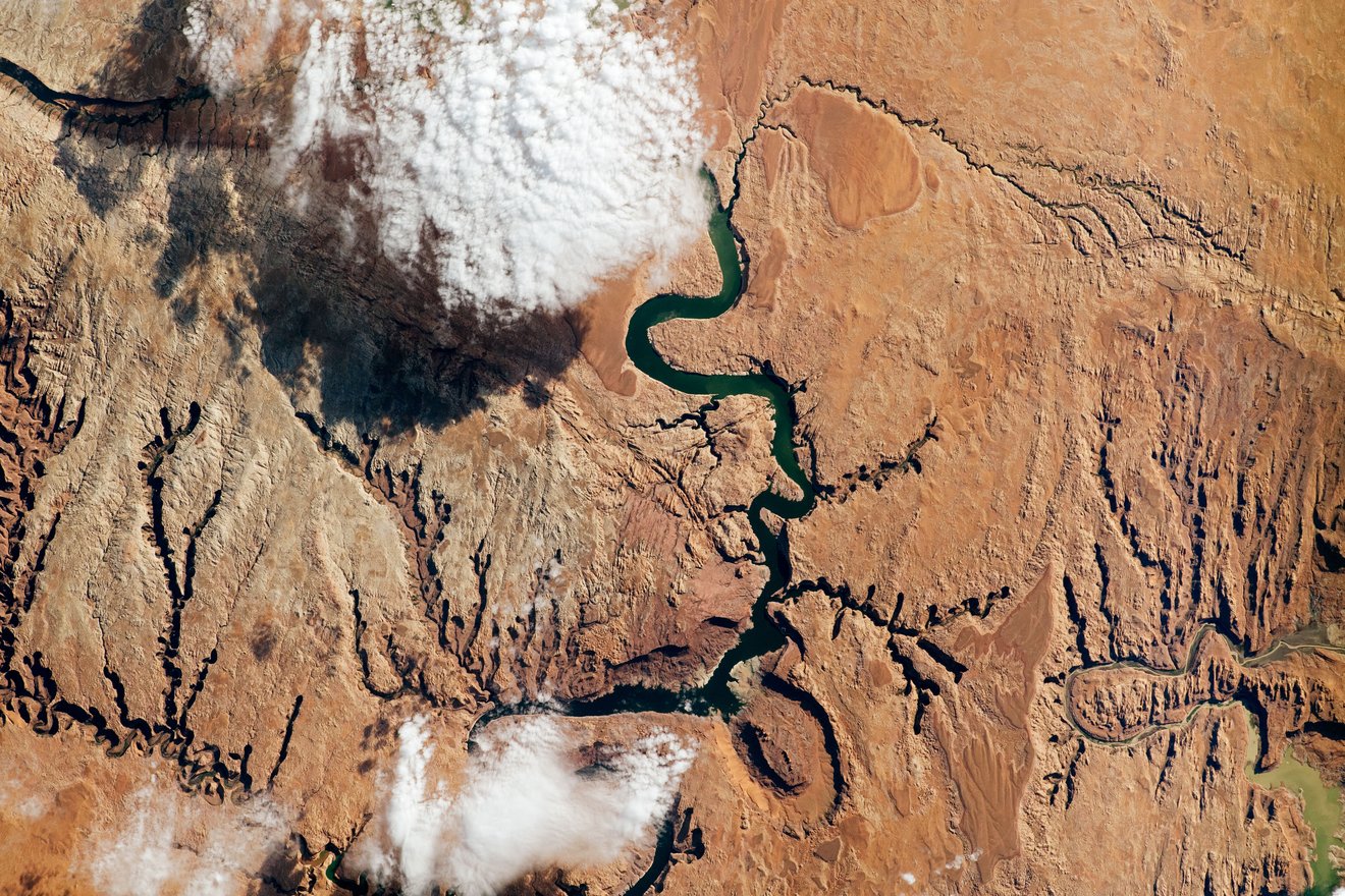 



The Colorado River supplies water to more than 40 million people as it snakes through seven U.S. states, including the part of southeastern Utah seen in this photo snapped by an astronaut aboard the International Space Station. The Colorado basin was identified in a NASA-led study as a region experiencing intense human water use.

Credit: NASA


